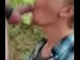 Puppy boy sucking hot cock in logging road