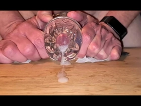Fucking my fleshlight with huge slow motion cumshot landing on the table